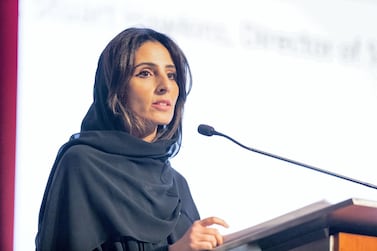 Razan Al Mubarak addresses an audience at the Milken Institute forum in Abu Dhabi in 2018. The National