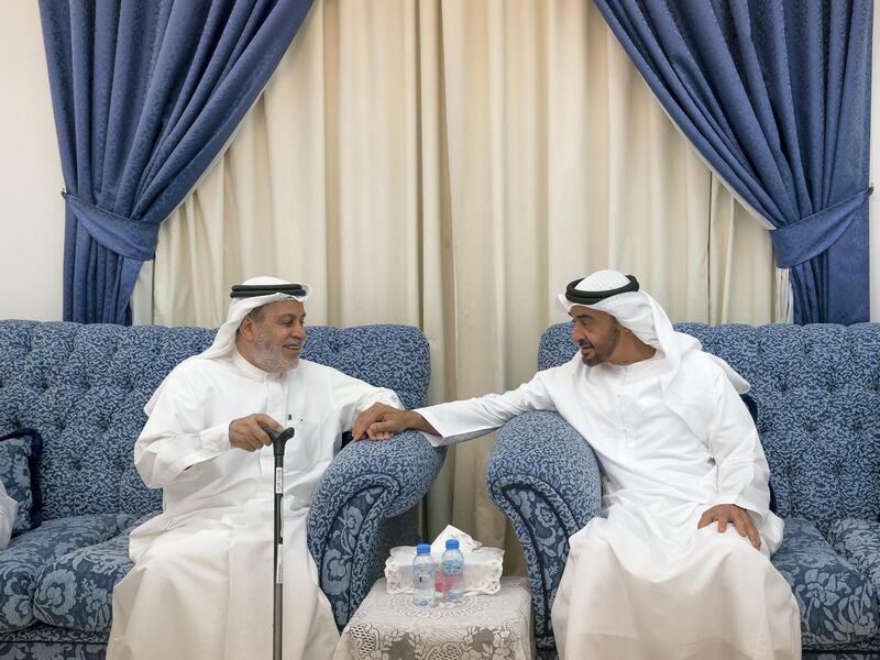 ABU DHABI, UNITED ARAB EMIRATES - October 09, 2017: HH Sheikh Mohamed bin Zayed Al Nahyan, Crown Prince of Abu Dhabi and Deputy Supreme Commander of the UAE Armed Forces (R) visits the home of his former teacher, Ahmed Mandi (L), at Khalifa City.
( Mohamed Al Hammadi / Crown Prince Court - Abu Dhabi )
---