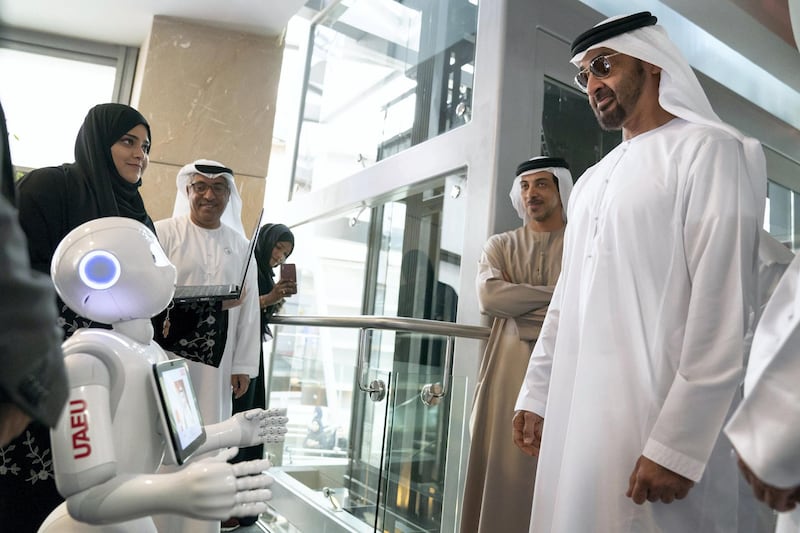 AL AIN, ABU DHABI, UNITED ARAB EMIRATES - February 07, 2019: HH Sheikh Mohamed bin Zayed Al Nahyan, Crown Prince of Abu Dhabi and Deputy Supreme Commander of the UAE Armed Forces (R),looks at a robots, during a visit to the United Arab Emirates University. Seen with HH Sheikh Mansour bin Zayed Al Nahyan, UAE Deputy Prime Minister and Minister of Presidential Affairs (2nd R).
( Mohamed Al Hammadi / Ministry of Presidential Affairs )
---