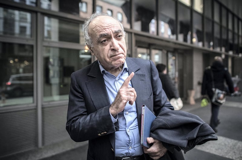 Franco-Lebanese businessman Ziad Takieddine gestures as he arrives at the anti-corruption police office (OCLCIFF) in Nanterre, on November 17, 2016, for his hearing after he admitted delivering three cash-stuffed suitcases from the Libyan leader toward French former President Nicolas Sarkozy.
Nicolas Sarkozy's links with the late Moamer Kadhafi came under fresh scrutiny on November 15, 2016 after Ziad Takieddine admitted delivering three cash-stuffed suitcases from the Libyan leader toward the Frenchman's first presidential bid. In an interview with the Mediapart investigative news site, Takieddine said he had made three trips from Tripoli to Paris in late 2006 and early 2007 with cash for Sarkozy's campaign.
 / AFP PHOTO / PHILIPPE LOPEZ