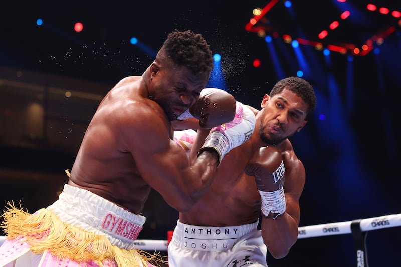 Anthony Joshua lands the punch that knocks out Francis Ngannou. Getty Images