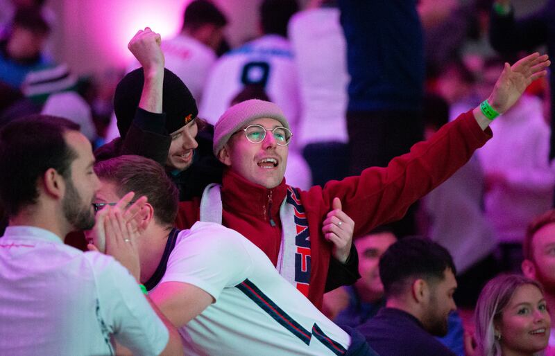 Fans celebrate in Manchester as England score in the Fifa World Cup match against Iran in Doha. England romped to a 6-2 victory. EPA