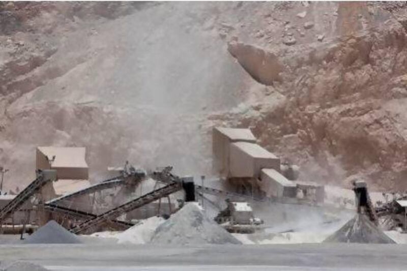 Crushers in Ras Al Khaimah break down boulders blasted from the nearby mountains into aggregates for building materials, but they also increase health risks to locals. Antonie Robertson / The National