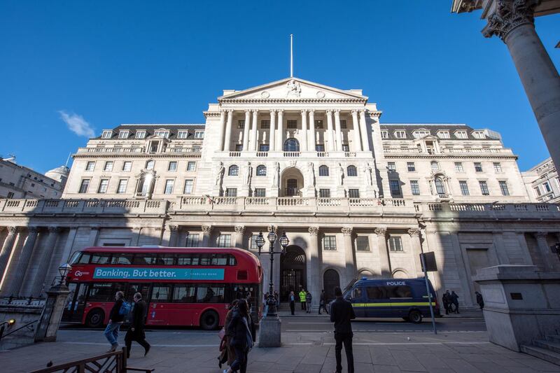 LONDON, ENGLAND - JANUARY 28: A general view of the Bank of England with a London bus with an advertising billboard saying "Banking but Better" and a Police van passing by on a clear sunny day  on January 28, 2019 in London, England. (Photo by John Keeble/Getty Images)