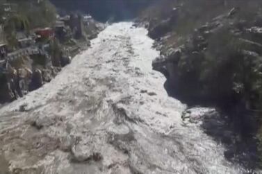 A flood in Uttarakhand state, February 7, 2021, is shown in this still obtained from a video. Reuters 