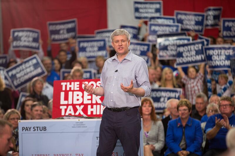 Conservative leader Stephen Harper speaks to supporters at a rally in London, Ontario on October 13, 2015. Canada votes in legislative elections on October 19. AFP PHOTO/ GEOFF ROBINS (Photo by GEOFF ROBINS / AFP)