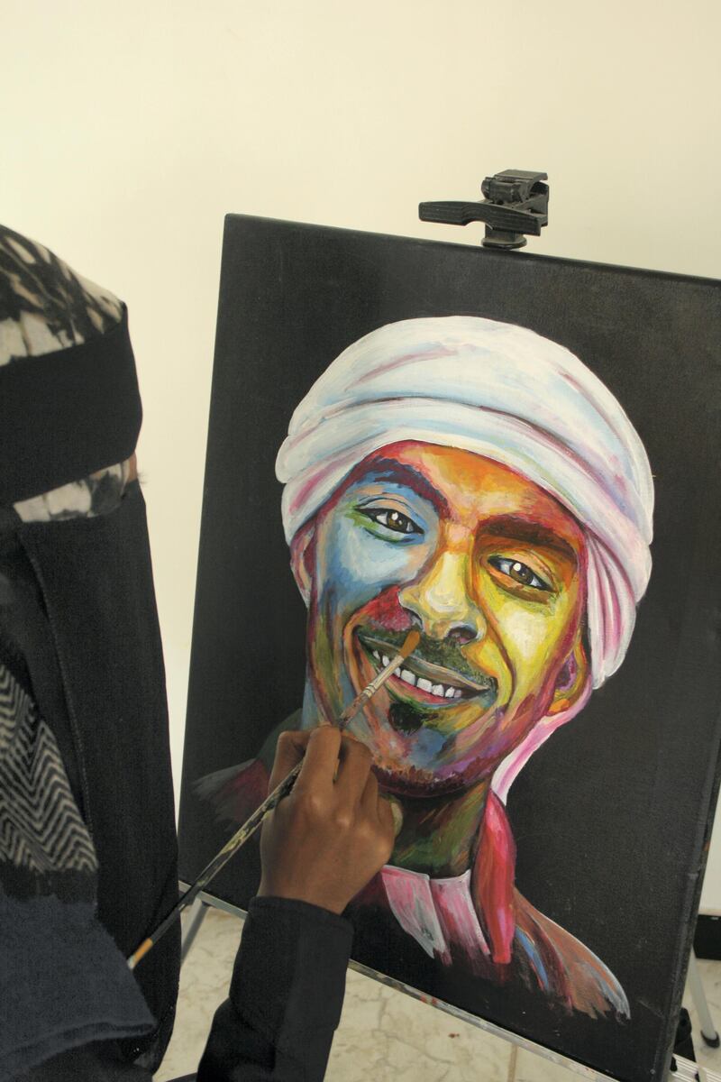 A portrait is painted to remember Emirati martyr Lieutenant Abdulaziz Al Kaabi. Courtesy: Summer Baobaid