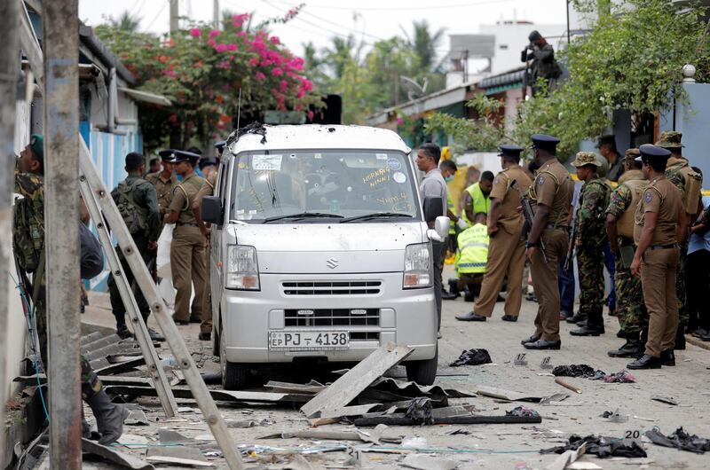 Security personnel seen at the site of an overnight gun battle, between troops and suspected terrorists, on the east coast of Sri Lanka, in Kalmunai. Reuters