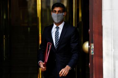Britain's Chancellor of the Exchequer, Rishi Sunak, leaves a television studio in London on October 6. Available for six months, the new job support scheme will be reviewed in January. Reuters