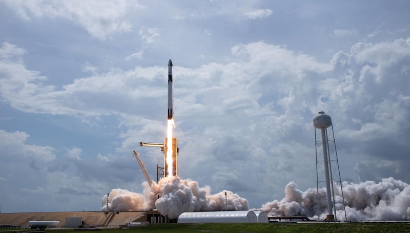This handout photo released by NASA shows a SpaceX Falcon 9 rocket carrying the company's Crew Dragon spacecraft launched from Launch Complex 39A on NASA’s SpaceX Demo-2 mission to the International Space Station with NASA astronauts Robert Behnken and Douglas Hurley onboard on May 30, 2020, at NASA’s Kennedy Space Center in Florida.  The Demo-2 mission is the first launch with astronauts of the SpaceX Crew Dragon spacecraft and Falcon 9 rocket to the International Space Station as part of the agency’s Commercial Crew Program. The test flight serves as an end-to-end demonstration of SpaceX’s crew transportation system. Behnken and Hurley launched at 3:22 p.m. EDT on Saturday, May 30, from Launch Complex 39A at the Kennedy Space Center. A new era of human spaceflight is set to begin as American astronauts once again launch on an American rocket from American soil to low-Earth orbit for the first time since the conclusion of the Space Shuttle Program in 2011. - RESTRICTED TO EDITORIAL USE - MANDATORY CREDIT "AFP PHOTO / NASA / BILL INGALLS" - NO MARKETING - NO ADVERTISING CAMPAIGNS - DISTRIBUTED AS A SERVICE TO CLIENTS
 / AFP / NASA / Bill INGALLS / RESTRICTED TO EDITORIAL USE - MANDATORY CREDIT "AFP PHOTO / NASA / BILL INGALLS" - NO MARKETING - NO ADVERTISING CAMPAIGNS - DISTRIBUTED AS A SERVICE TO CLIENTS

