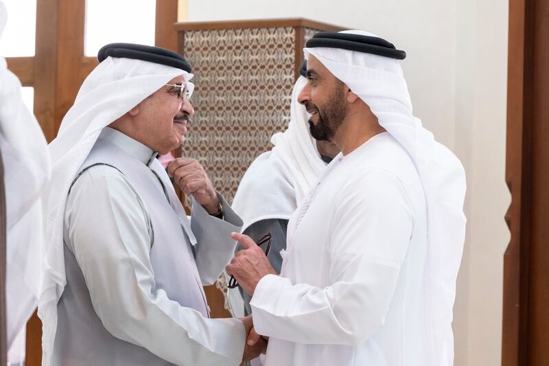 Sheikh Saif bin Zayed, Deputy Prime Minister and Minister of Interior, greets a member of the Bahraini delegation, at Sakhir Airbase in Bahrain. Mohamed Al Hammadi / UAE Presidential Court 