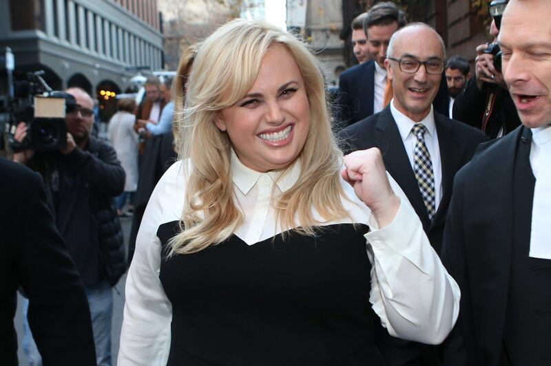 epa06201290 (FILE) - Australian actress Rebel Wilson makes fist as she leaves the Victorian Supreme Court after winning her case, in Melbourne, Victoria, Australia, 15 June 2017 (reissued 13 September 2017). Wilson was awarded on 13 September 2017, 650,000 Australian dollar (about 521,940 US dollar) in general damages and 3,917,472 Australian dollar (about 3.1 million US dollar) in special damages by Justice Dixon stating the damage to Wilson's reputation was 'unprecedented' and she suffered 'financial loss' as a result of the Bauer Media articles being amplified by Hollywood gossip sites.  EPA/DAVID CROSLING  AUSTRALIA AND NEW ZEALAND OUT