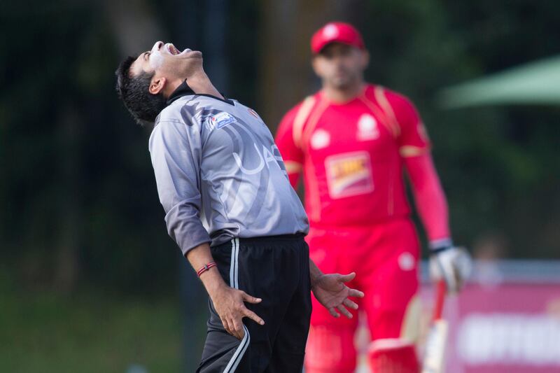KING CITY, CANADA : August 6, 2013 UAE captain Khurram Khan reacts after appealing  unsuccessfully for   Canada's captain Rizwath Cheema's wicket  during the one day international  at the Maple Leaf Cricket club in King City, Ontario, Canada ( Chris Young/ The National). For Sports *** Local Caption ***  chy214.jpg