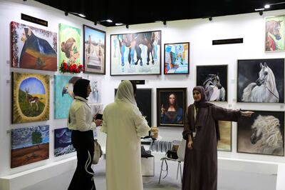 Art galleries at the World Art Dubai held at Dubai World Trade Centre in Dubai. Pawan Singh / The National
