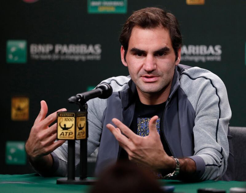 epa06590527 Roger Federer of Switzerland responds to questions during a press conference at the BNP Paribas Open at the Indian Wells  Tennis Garden in Indian Wells, California, USA, 08 March 2018.  EPA/JOHN G. MABANGLO