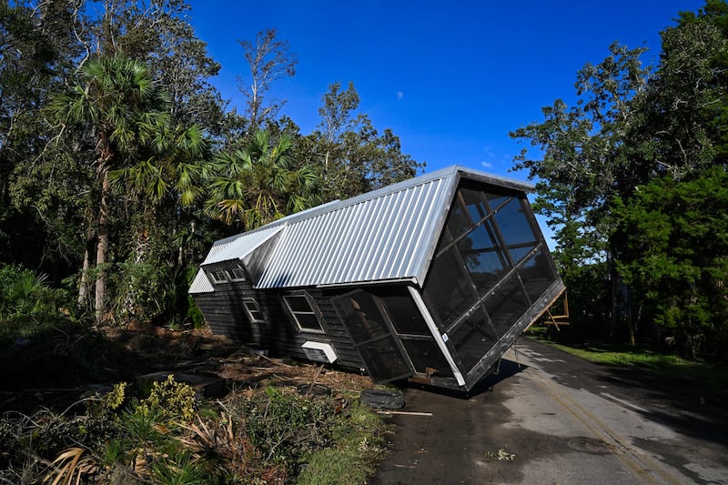 A mobile home swept by floodwaters in Steinhatchee, Florida, in August 2023, after Hurricane Idalia made landfall. Idalia slammed into north-west Florida as an 'extremely dangerous' Category 3 storm, buffeting coastal communities as officials warned of 'catastrophic' flooding in parts of the southern US state.  AFP