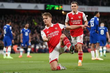 LONDON, ENGLAND - MAY 02: Martin Odegaard of Arsenal celebrates with teammates after scoring the team's second goal during the Premier League match between Arsenal FC and Chelsea FC at Emirates Stadium on May 02, 2023 in London, England. (Photo by Shaun Botterill / Getty Images)