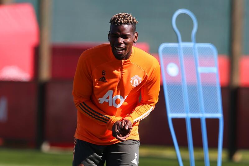 MANCHESTER, ENGLAND - APRIL 02:  Paul Pogba of Manchester United reacts during a first team training session at Aon Training Complex on April 2, 2021 in Manchester, England. (Photo by Matthew Peters/Manchester United via Getty Images)