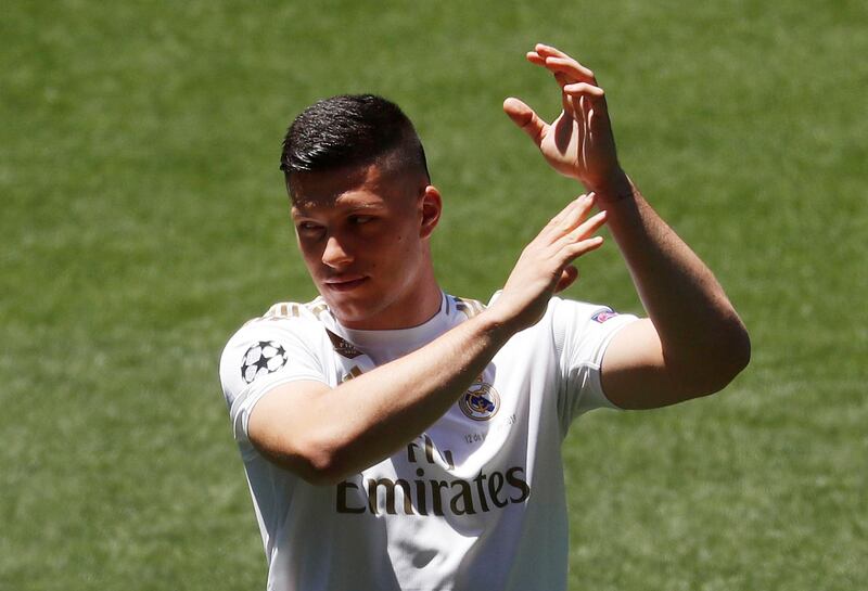 Luka Jovic applauds the crowd inside the Santiago Bernabeu during his unveiling.