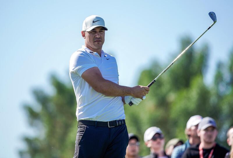 Abu Dhabi, United Arab Emirates, January 18, 2020.  2020 Abu Dhabi HSBC Championship.  Round 3.
Bruce Koepka tees off on the seventh hole.
Victor Besa / The National
Section:  SP
Reporter:  Paul Radley and John McAuley