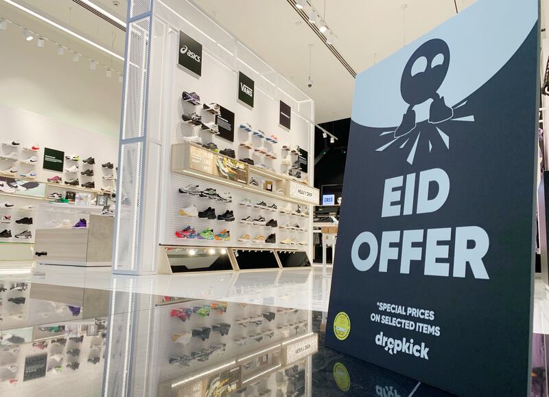 A sign for Eid sales at Dropkick, Dubai Hills Mall, Dubai. Chris Whiteoak / The National