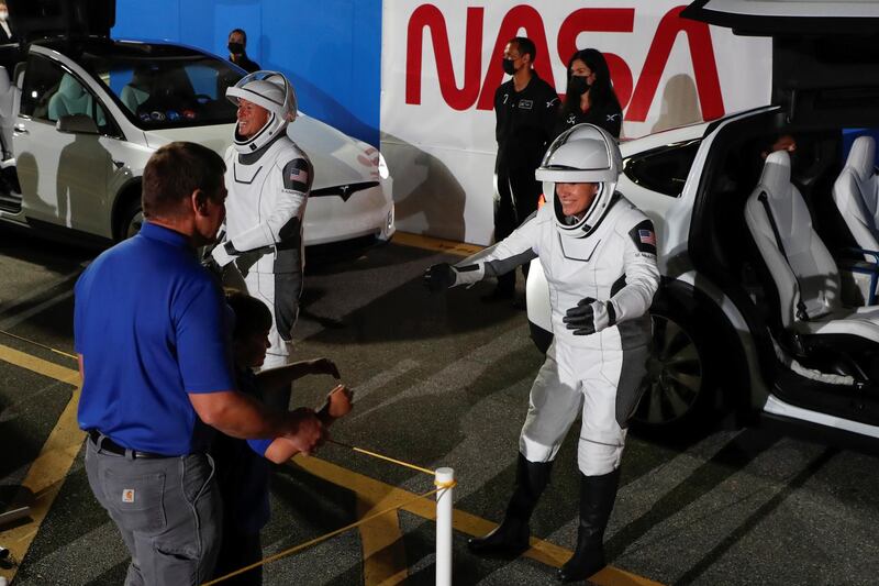Nasa astronaut Megan McArthur gave her son, Theodore Behnken and husband, Bob Behnken who is also an astronaut, a virtual hug as she arrived. Reuters