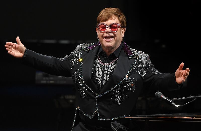 Elton John, in a black sequinned suit, performs at the A Day On The Green music festival in Geelong, Australia on December 7, 2019. EPA