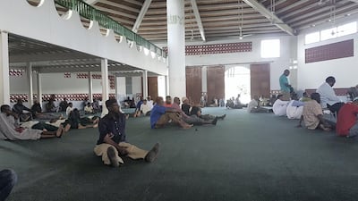 In this Feb. 10, 2017 photo, men pray at the ASJA Jammah Masjid Mosque of Iman Yasin Abu Bakr, leader of the Jamaat al Muslimeen in Port of Spain, Trinidad and Tobago. The Jamaat al Muslimeen is responsible for a 1990 coup attempt in Trinindad and Tobago, classified as the Western Hemisphere�������s only Islamist uprising. (AP Photo/Ricardo Nunes)