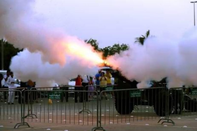 As the first day of Ramadan came to a close yesterday, Dubai Police followed a long tradition by firing their cannon to signal the end of fasting. Satish Kumar / The National