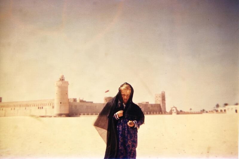 Deborah Henley, daughter of Susan and Tim Hillyard, outside Qasr Al Hosn in the 1950s. The building had just undergone a massive expansion whereby a new fort encircled the old. Photo: Susan Hillyard