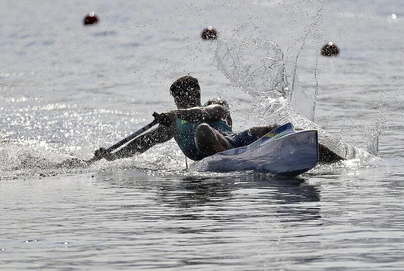 Brazil’s Isaquias Queiroz Dos Santos falls as he crosses the finish line during the men’s canoe single 200m heat. Luca Bruno / AP Photo