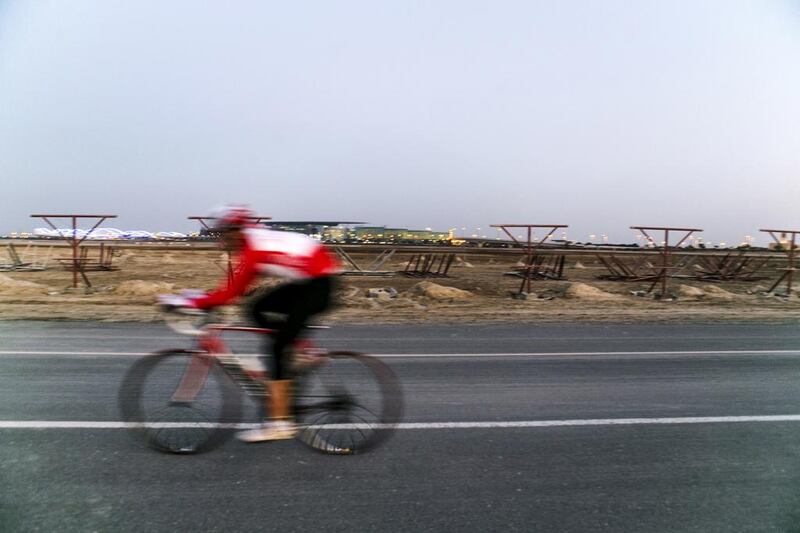 Cyclists whizz along Dubai's Nad Al Sheba Cycle Path. Reem Mohammed / The National  
