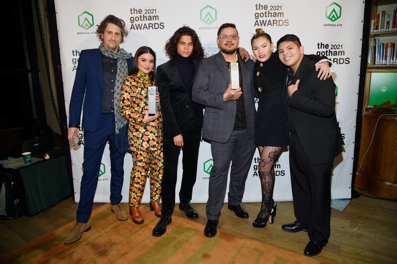 Garrett Basch, left, Devery Jacobs, D'Pharaoh Woon-A-Tai, Sterlin Harjo, Paulina Alexis and Lane Factor pose with the Breakthrough Series - Short Format (under 40 minutes) Award for 'Reservation Dogs'. AP