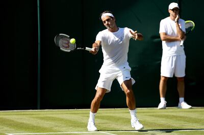 LONDON, ENGLAND - JUNE 29:  Roger Federer of Switzerland practices on court during training for the Wimbledon Lawn Tennis Championships at the All England Lawn Tennis and Croquet Club at Wimbledon on June 29, 2018 in London, England.  (Photo by Matthew Stockman/Getty Images)