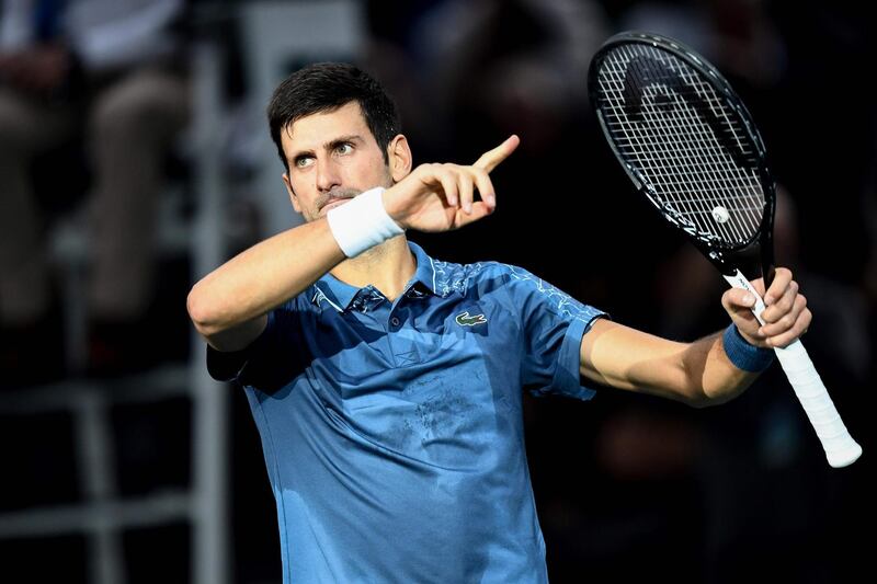 Serbia's Novak Djokovic celebrates after winning against Croatia's Marin Cilic at the end of their men's singles quarter-final tennis match on day five of the ATP World Tour Masters 1000 - Rolex Paris Masters - indoor tennis tournament at The AccorHotels Arena in Paris, on November 2, 2018. / AFP / Anne-Christine POUJOULAT            
