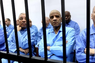 Former Libyan intelligence chief Abdullah al-Senussi (front row, second from right). Abu Agila Mohammad Masud is believed to be seated behind him. AFP