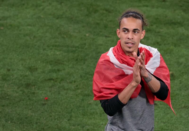 Denmark's Yussuf Poulsen celebrates after the match. Reuters