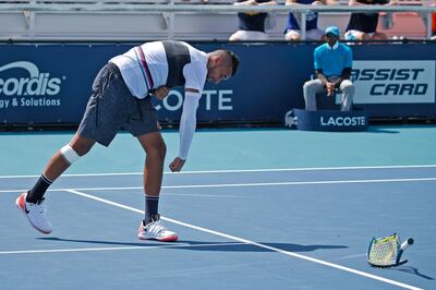 Nick Kyrgios, of Australia, smashes his racket during the match against Borna Coric, of Croatia, during the Miami Open tennis tournament, Tuesday, March 26, 2019, in Miami Gardens, Fla. (AP Photo/Joel Auerbach)