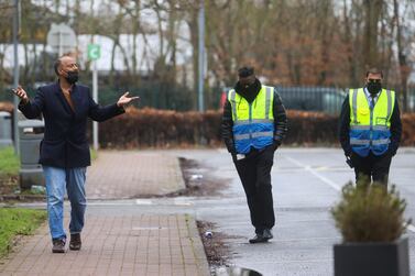 Mohamed Noor takes his daily exercise outside the Holiday Inn Hotel near Heathrow Airport, London. Reuters 