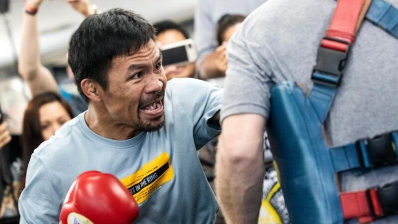 Manny Pacquiao sent a message to Floyd Mayweather Jr trying to tempt his long-term rival out of retirement. AFP