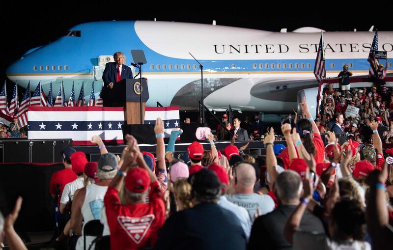 US President Donald Trump holds a Make America Great Again rally as he campaigns at Orlando Sanford International Airport in Sanford, Florida.  AFP