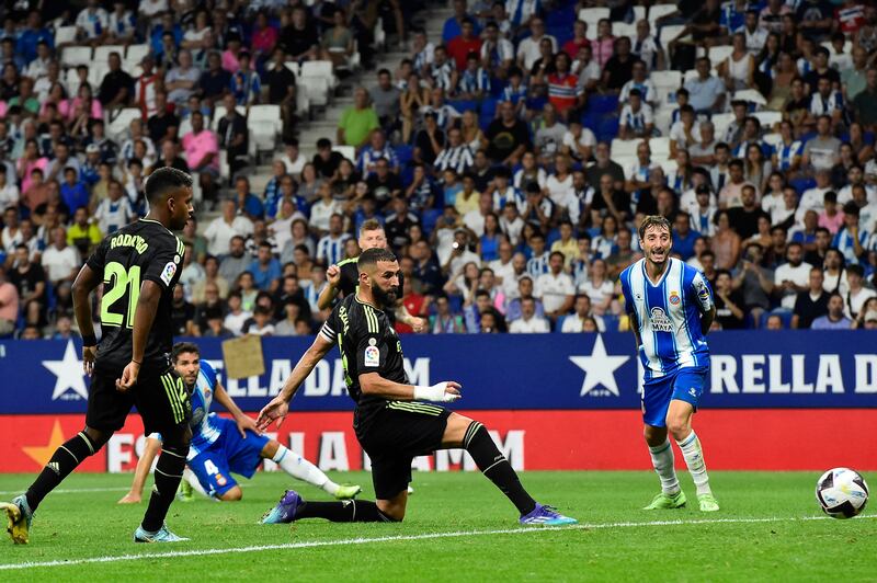 Real Madrid striker Karim Benzema has a shot on goal against Espanyol. AFP