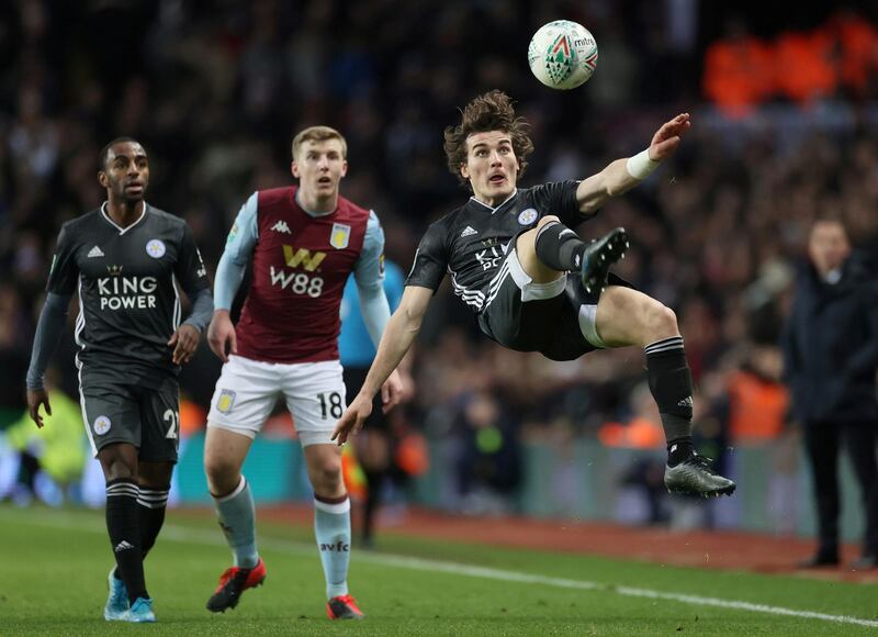 Leicester City's Caglar Soyuncu attempts an acrobatic clearance. Reuters