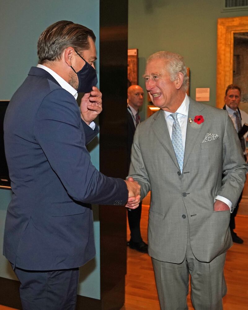 Prince Charles shakes hands with Leonardo DiCaprio at the Kelvingrove Art Gallery and Museum in Glasgow. Photo: PA