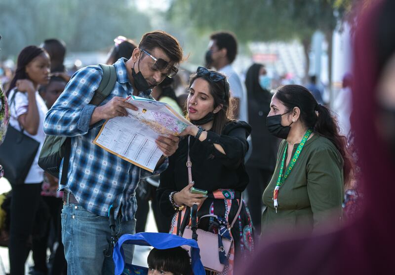 Visitors navigate India Day at Expo 2020 Dubai.