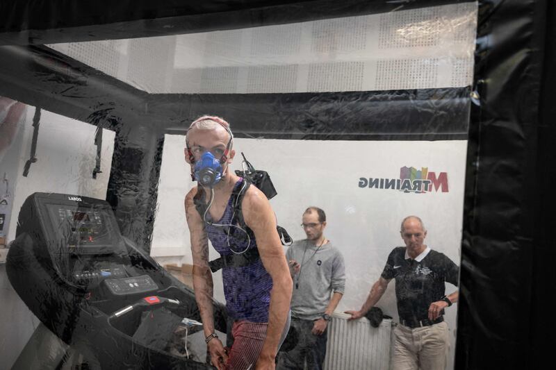 Theo de Meyere prepares to run on a treadmill in a hypoxia tent at the French National Institute for Health and Medical Research in Dijon, eastern France. AFP
