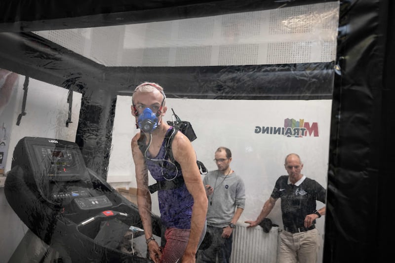 Theo de Meyere prepares to run on a treadmill in a hypoxia tent at the French National Institute for Health and Medical Research in Dijon, eastern France. AFP