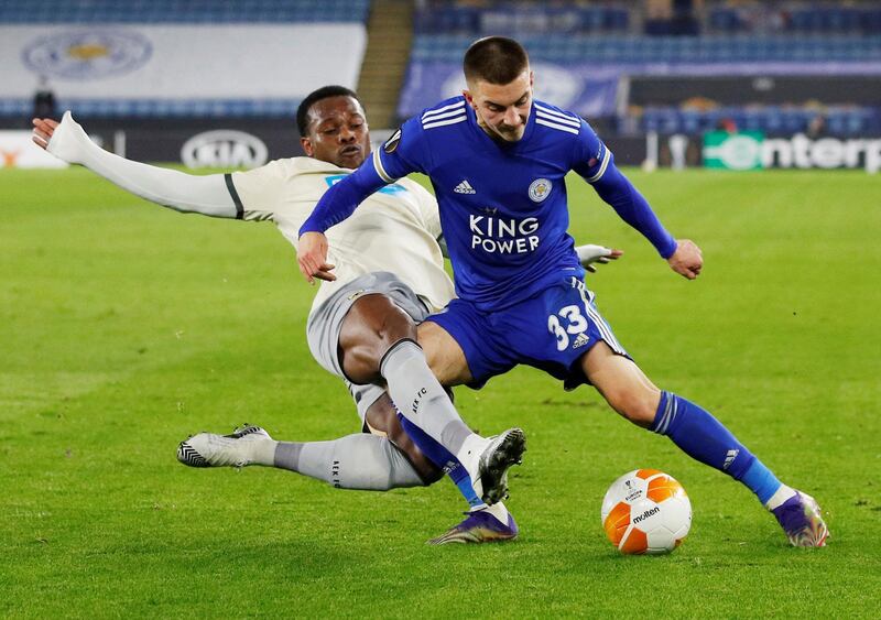 Luke Thomas of Leicester is challenged by AEK Athens' Levi Garcia. Reuters