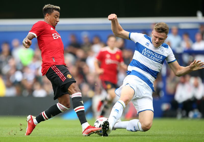 Manchester United's Jesse Lingard takes on Queens Park Rangers' Rob Dickie.