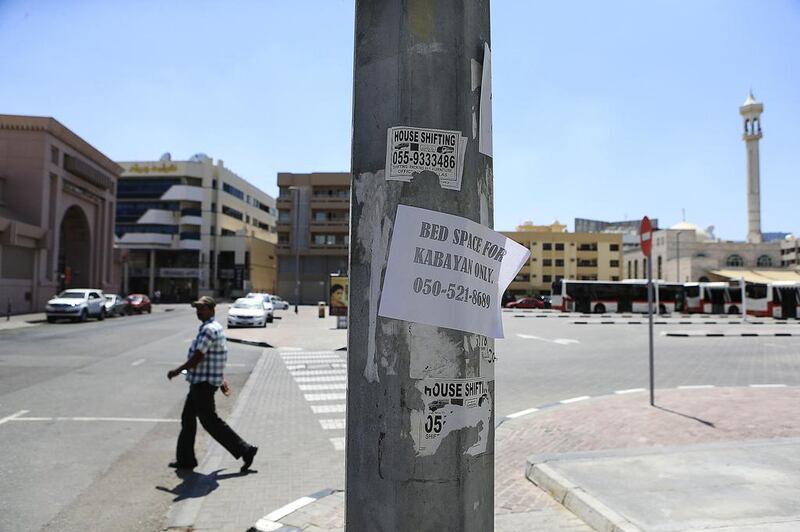 Dubai clamps down on illegal advertisers such as this one on a lamp post in Karama, Dubai. Sarah Dea/The National